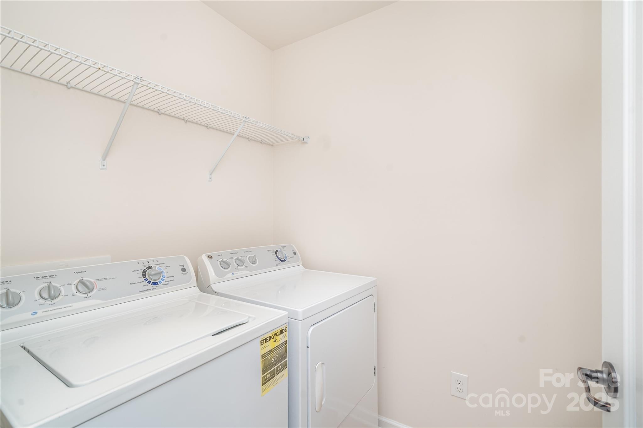 1528 Spring Blossom Trail Fort Mill, SC 29708 - Photo 23 of 26 a utility room with dryer and washer