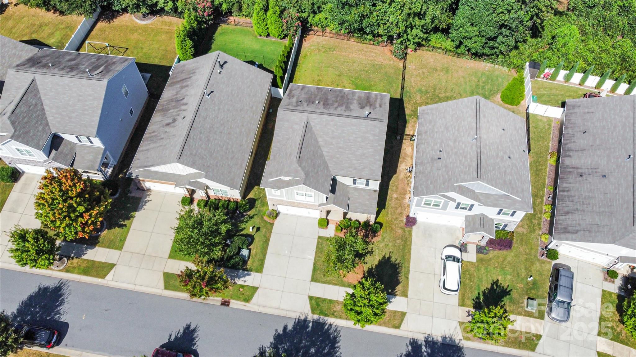 1528 Spring Blossom Trail Fort Mill, SC 29708 - Photo 24 of 26 an aerial view of residential house with outdoor space and swimming pool
