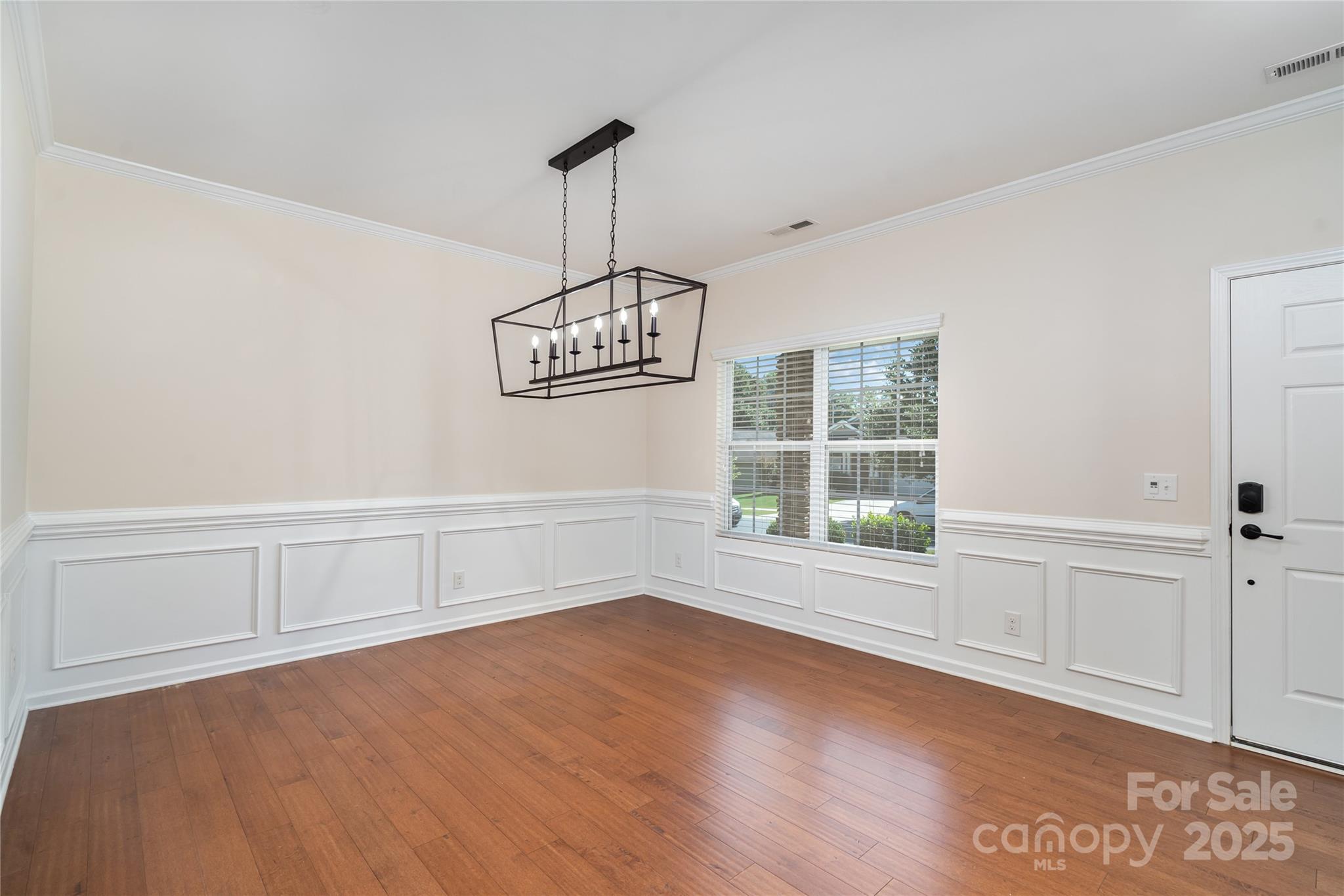 1528 Spring Blossom Trail Fort Mill, SC 29708 - Photo 5 of 26 a view of an empty room with a window
