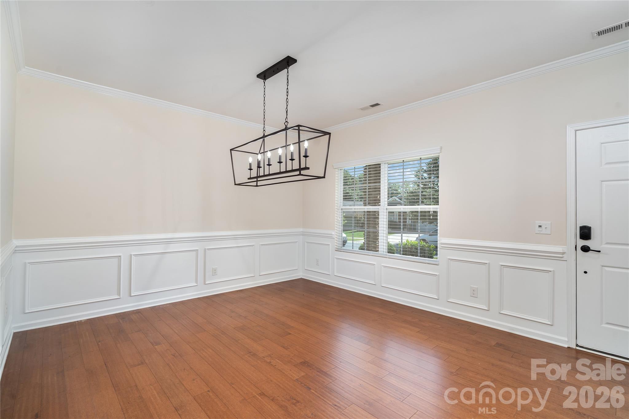 1528 Spring Blossom Trail Fort Mill, SC 29708 - Photo 6 of 31 a view of an empty room with a window