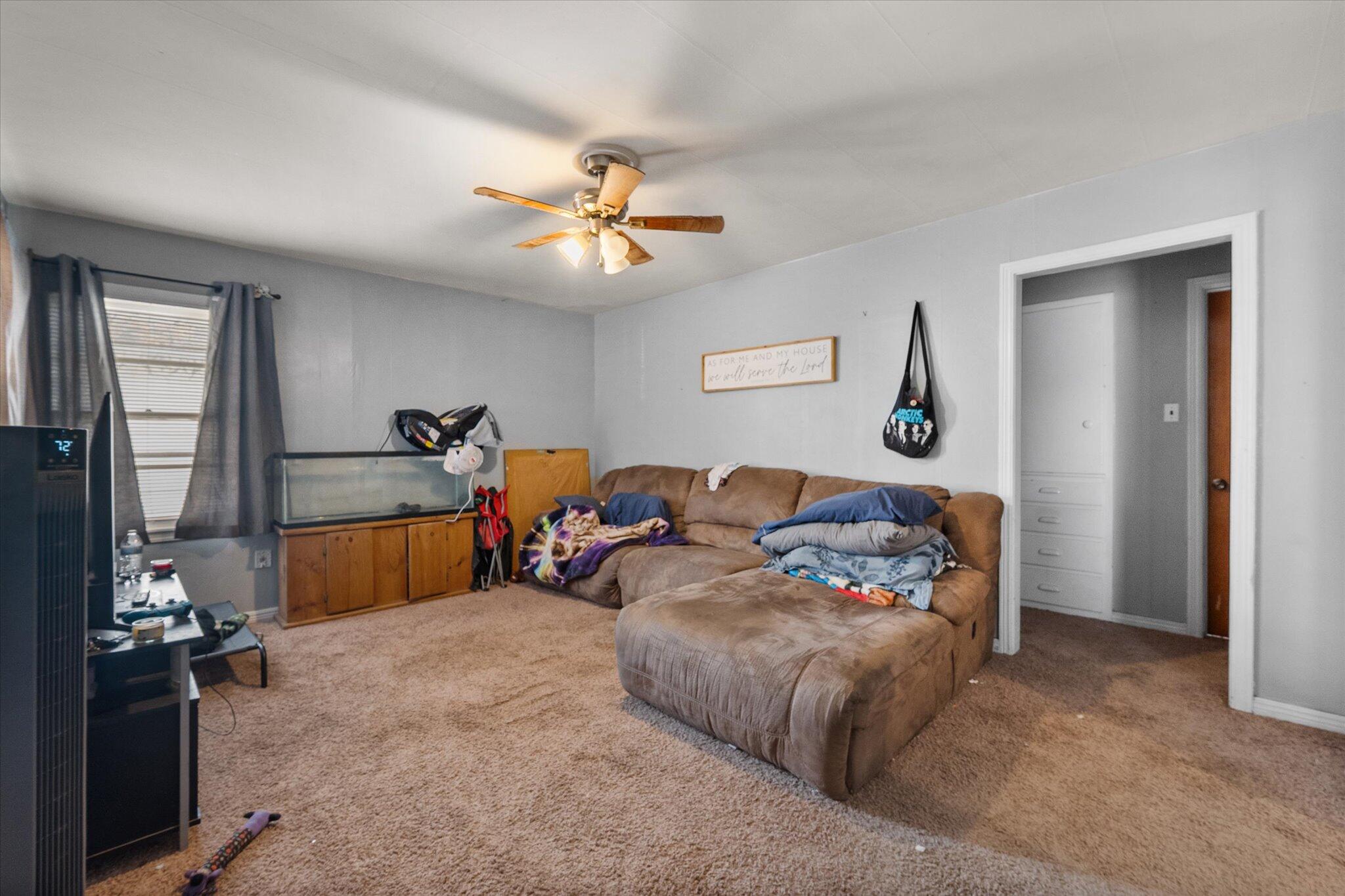 2013 58th Street Lubbock, TX 79412 - Photo 3 of 17 a living room with furniture