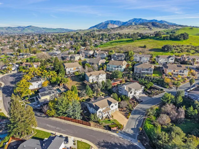 an aerial view of residential building and lake view