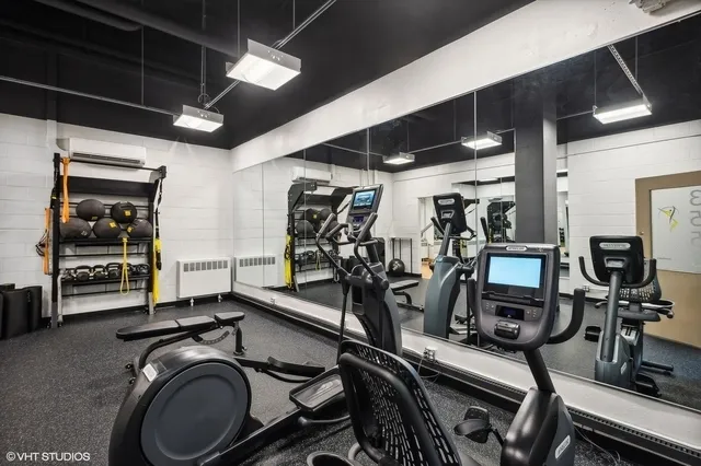 a view of a room with gym equipment