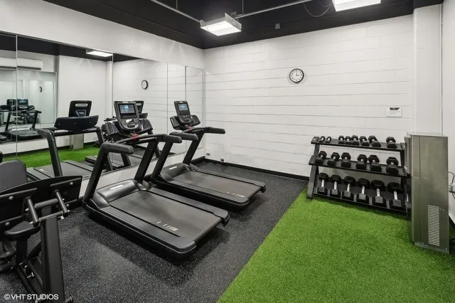 a view of a room with gym equipment