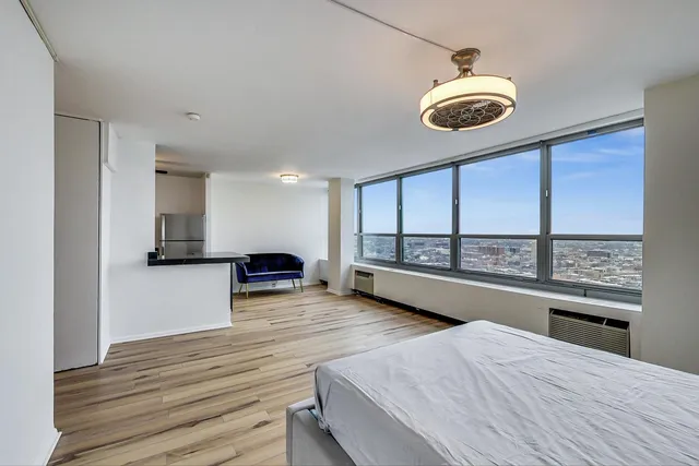 a view of a kitchen and a window