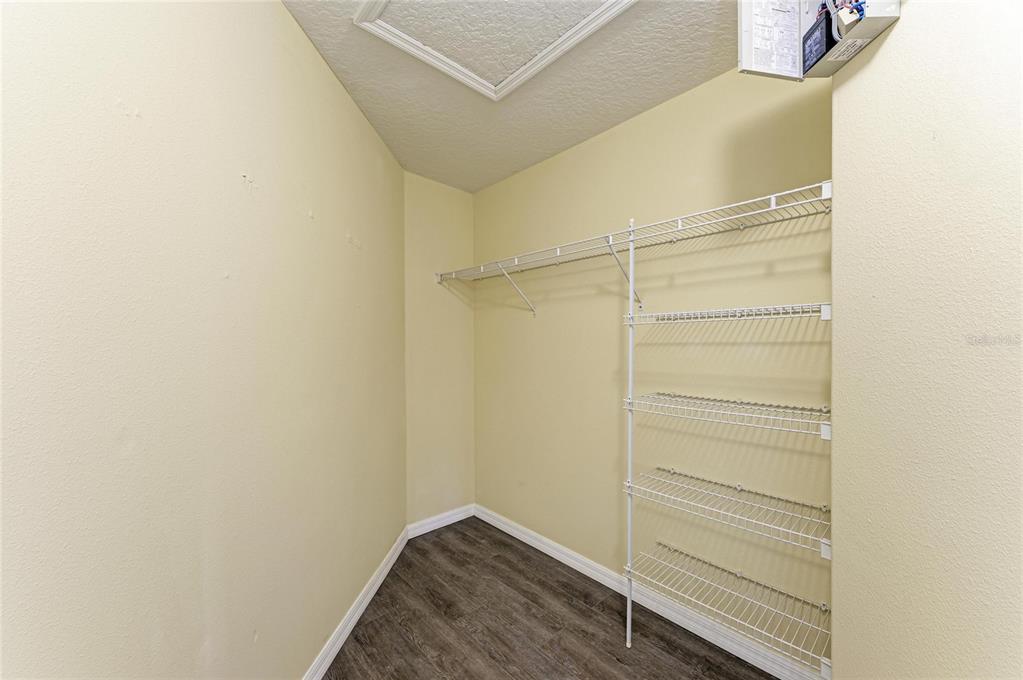 11611 Summit Rock Court Parrish, FL 34219 - Photo 32 of 54 a view of walk in closet