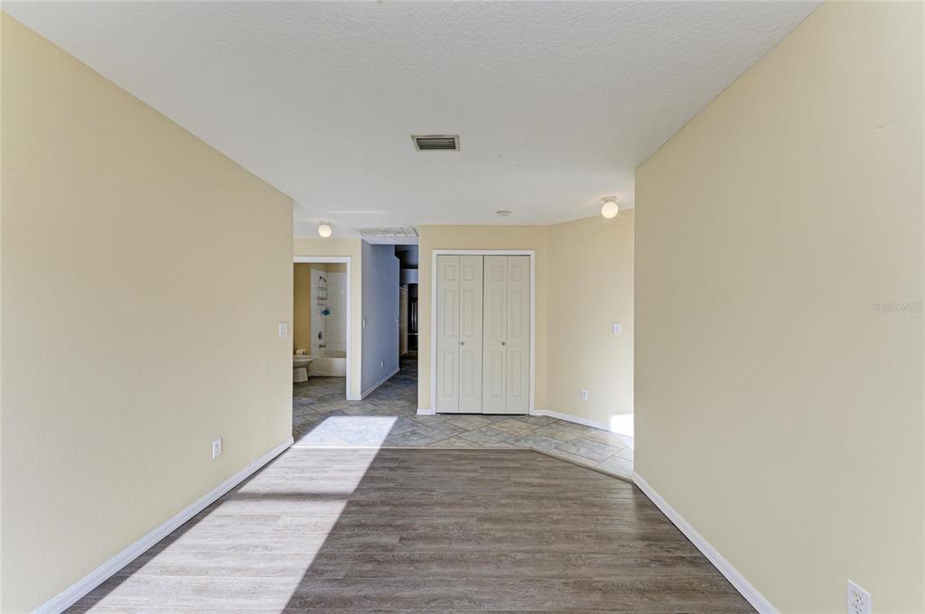 11611 Summit Rock Court Parrish, FL 34219 - Photo 34 of 54 a view of a hallway with wooden floor