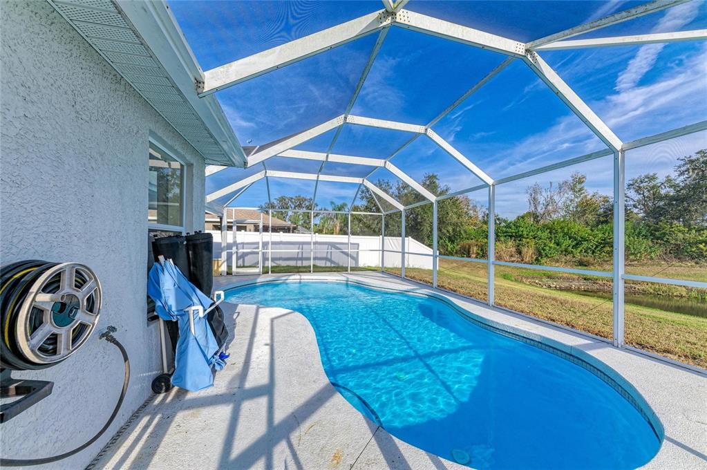 11611 Summit Rock Court Parrish, FL 34219 - Photo 49 of 54 a view of a swimming pool with a patio