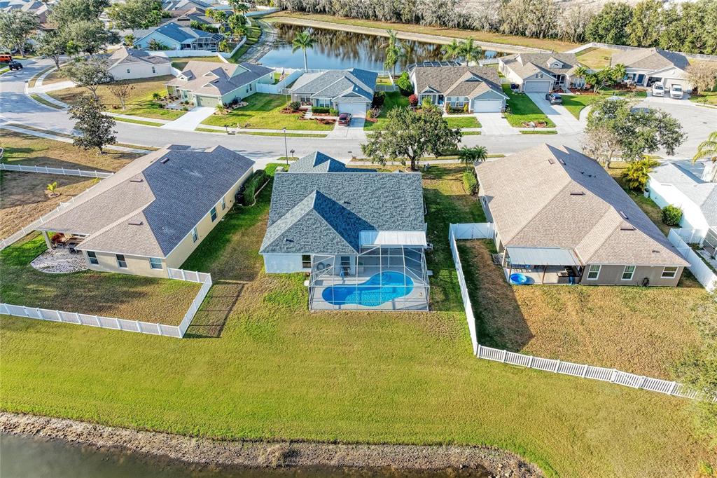 11611 Summit Rock Court Parrish, FL 34219 - Photo 5 of 54 an aerial view of a house with a swimming pool