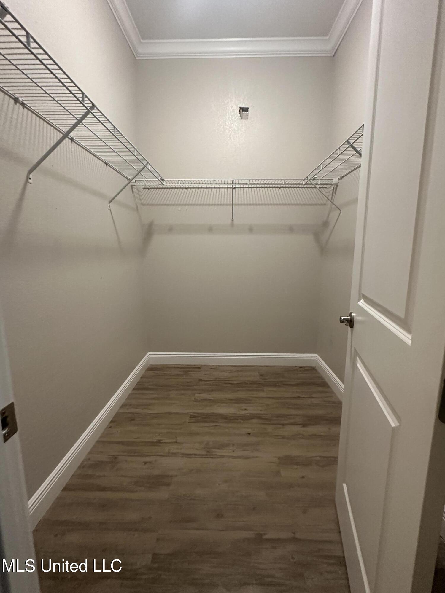 1822 15th Street, Unit B Gulfport, MS 39501 - Photo 8 of 17 Primary Bedroom Closet