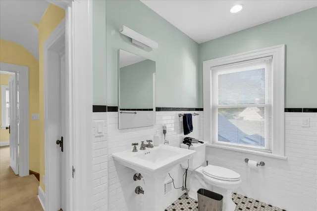 a bathroom with a shower and a sink