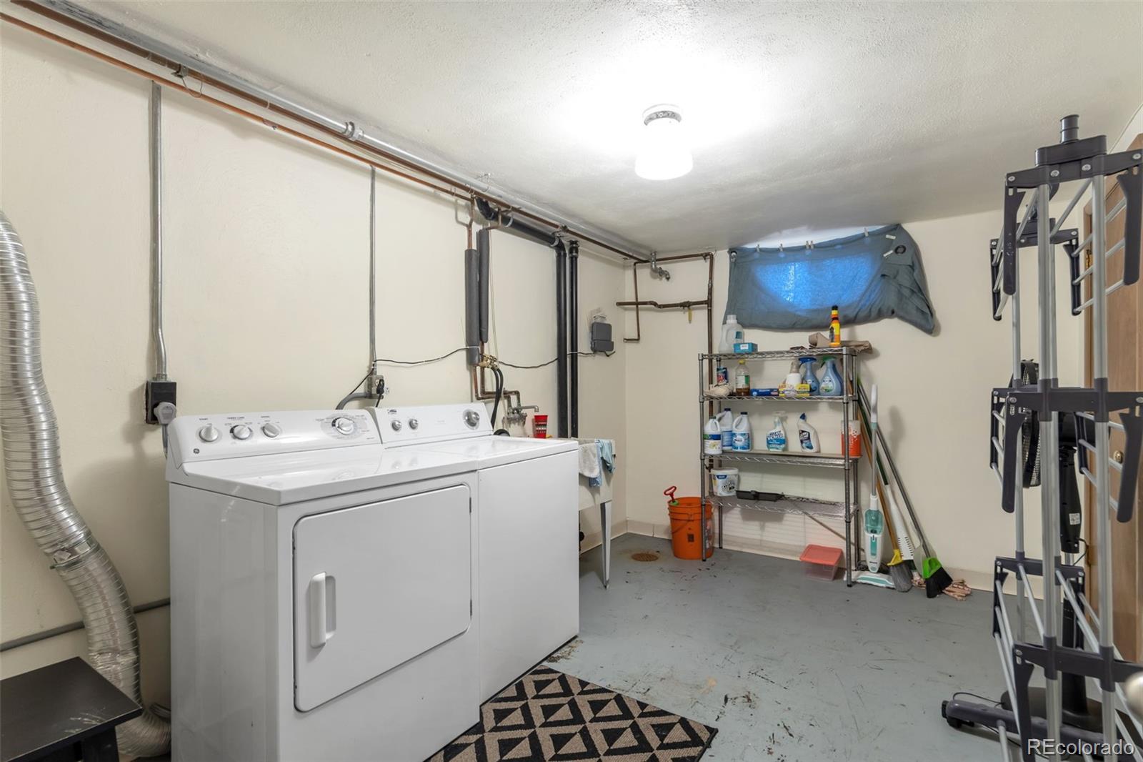 4901 Grove Street Denver, CO 80221 - Photo 17 of 25 a view of gym equipment and windows