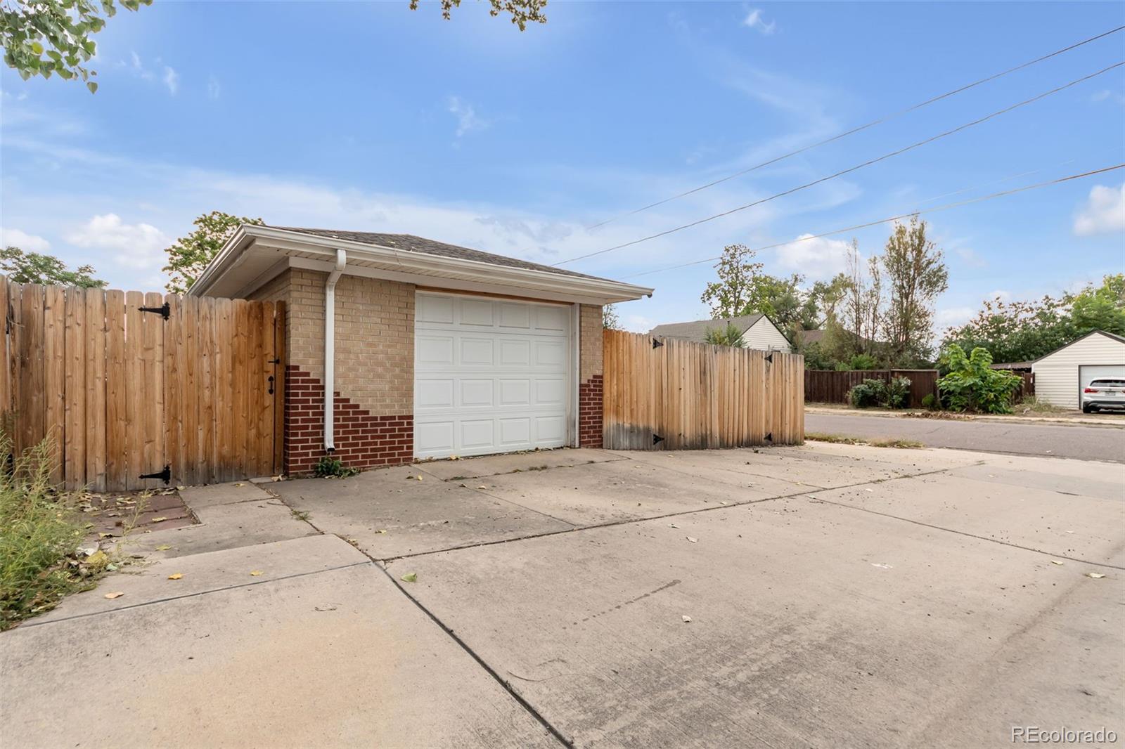 4901 Grove Street Denver, CO 80221 - Photo 23 of 25 a view of a house with basketball court
