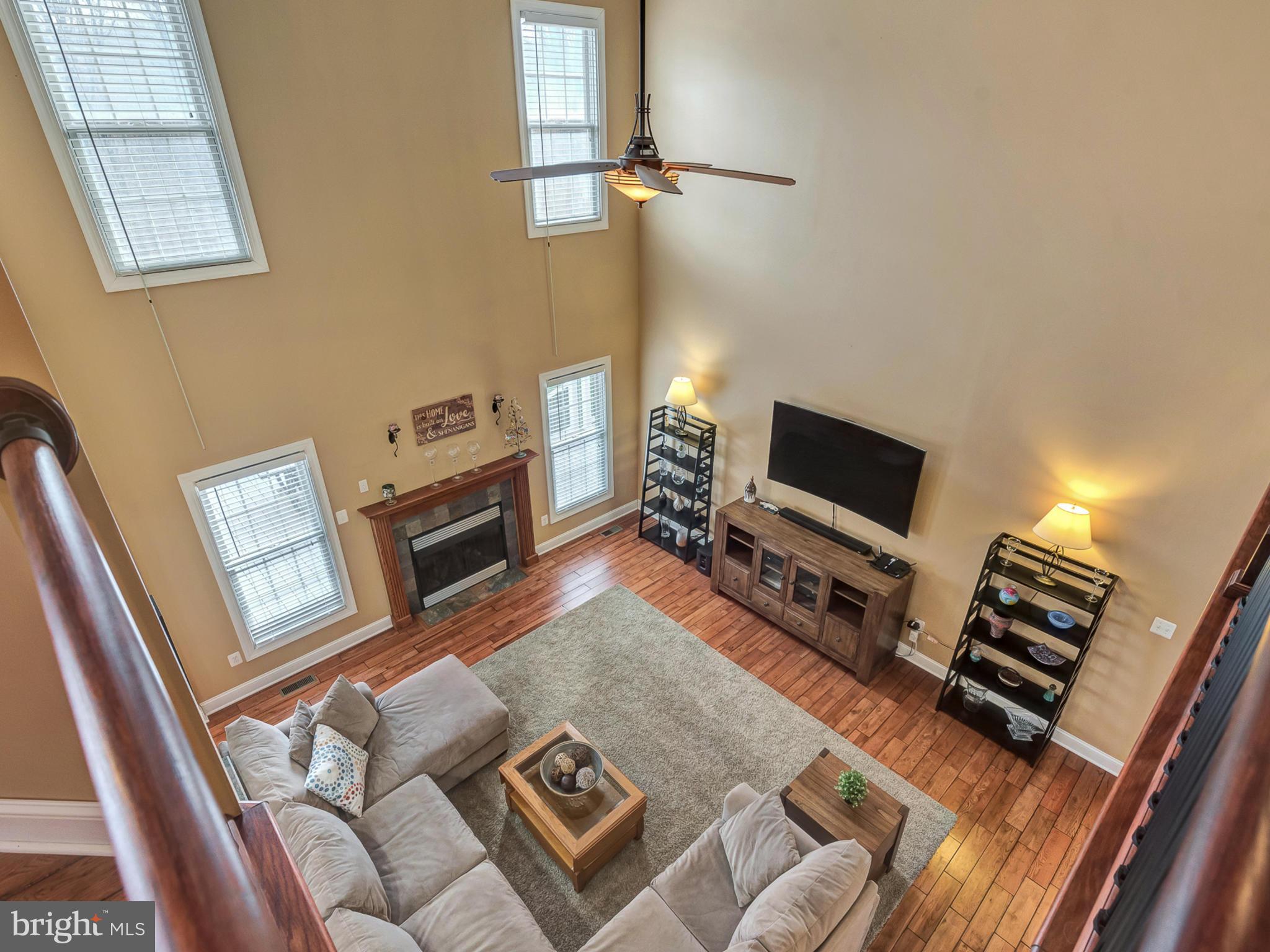 4947 Old Swimming Pool Road Frederick, MD 21703 - Photo 33 of 72 a living room with furniture and a flat screen tv