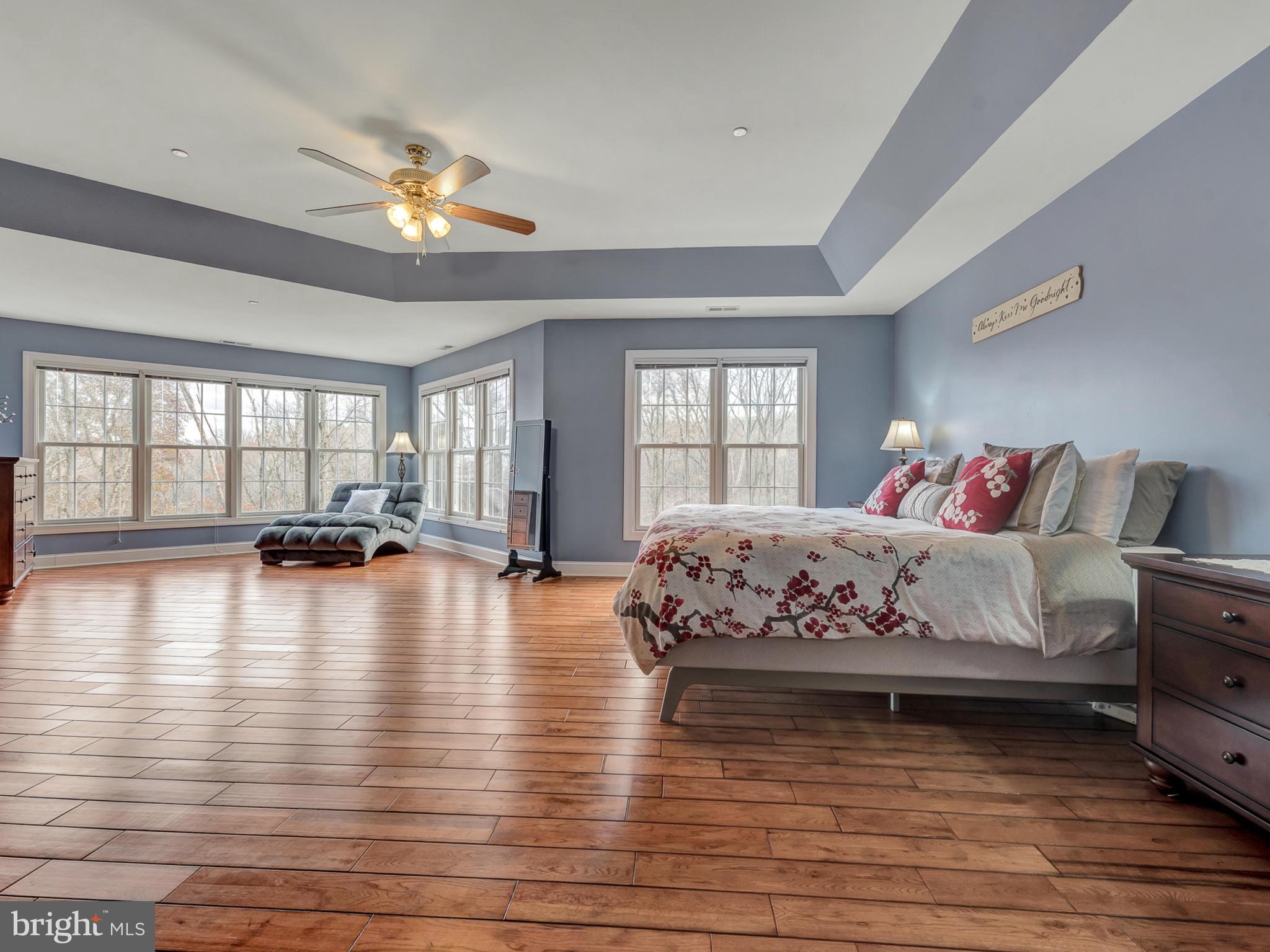 4947 Old Swimming Pool Road Frederick, MD 21703 - Photo 37 of 72 a spacious bedroom with a bed and a large window