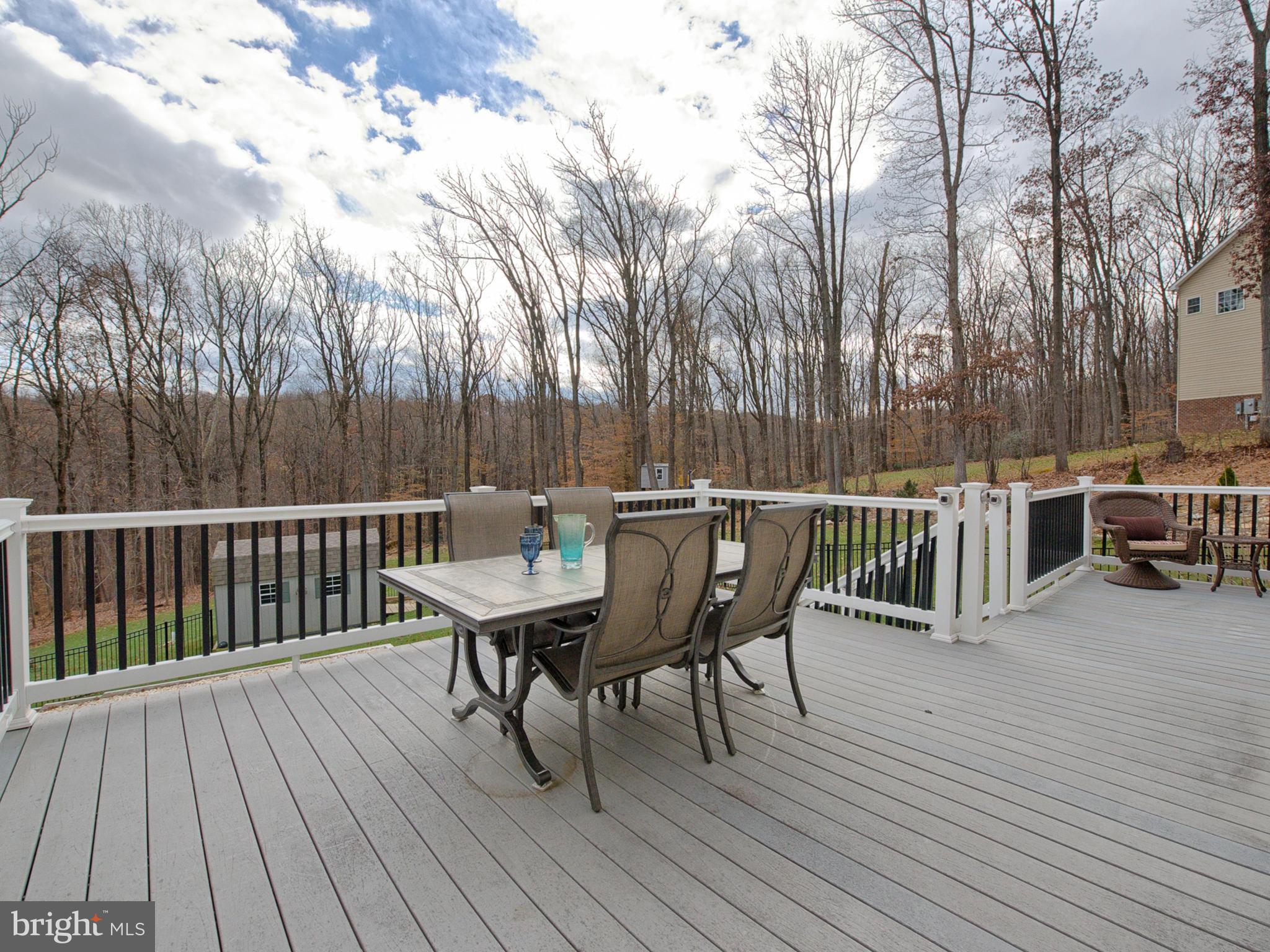 4947 Old Swimming Pool Road Frederick, MD 21703 - Photo 54 of 72 a view of a deck patio and outdoor seating