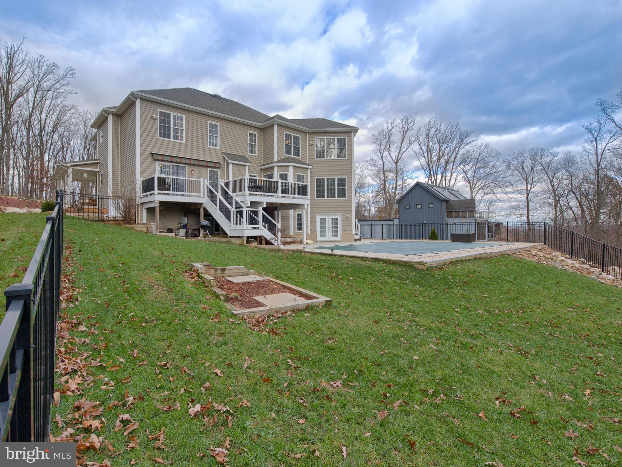 4947 Old Swimming Pool Road Frederick, MD 21703 - Photo 59 of 72 a view of a house with a yard porch and sitting area