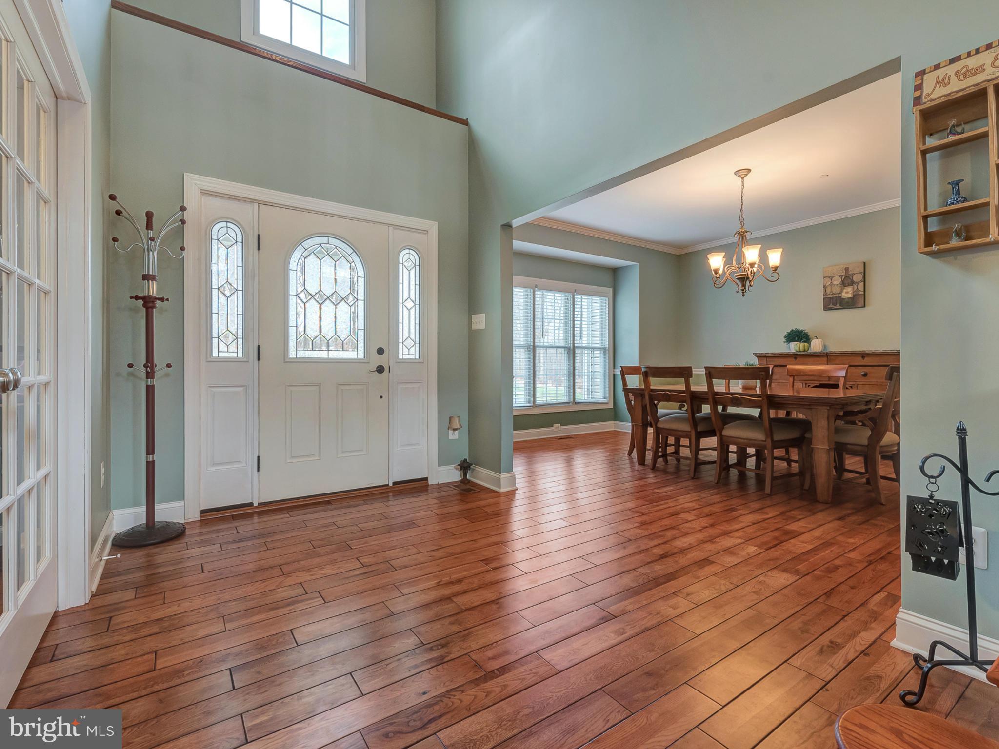 4947 Old Swimming Pool Road Frederick, MD 21703 - Photo 7 of 72 a view of a livingroom with furniture and wooden floor