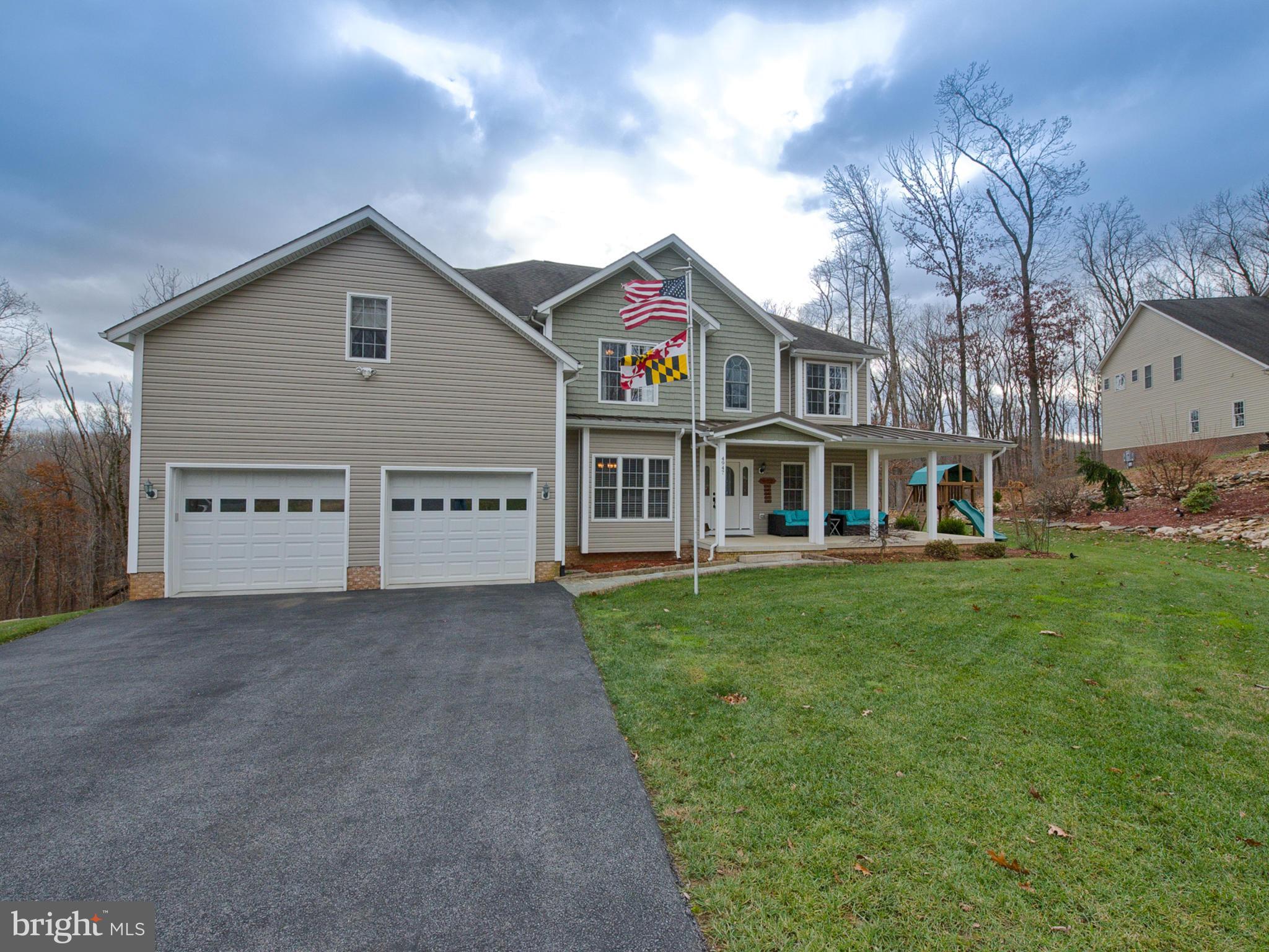 4947 Old Swimming Pool Road Frederick, MD 21703 - Photo 62 of 72 a view of house with yard and green space