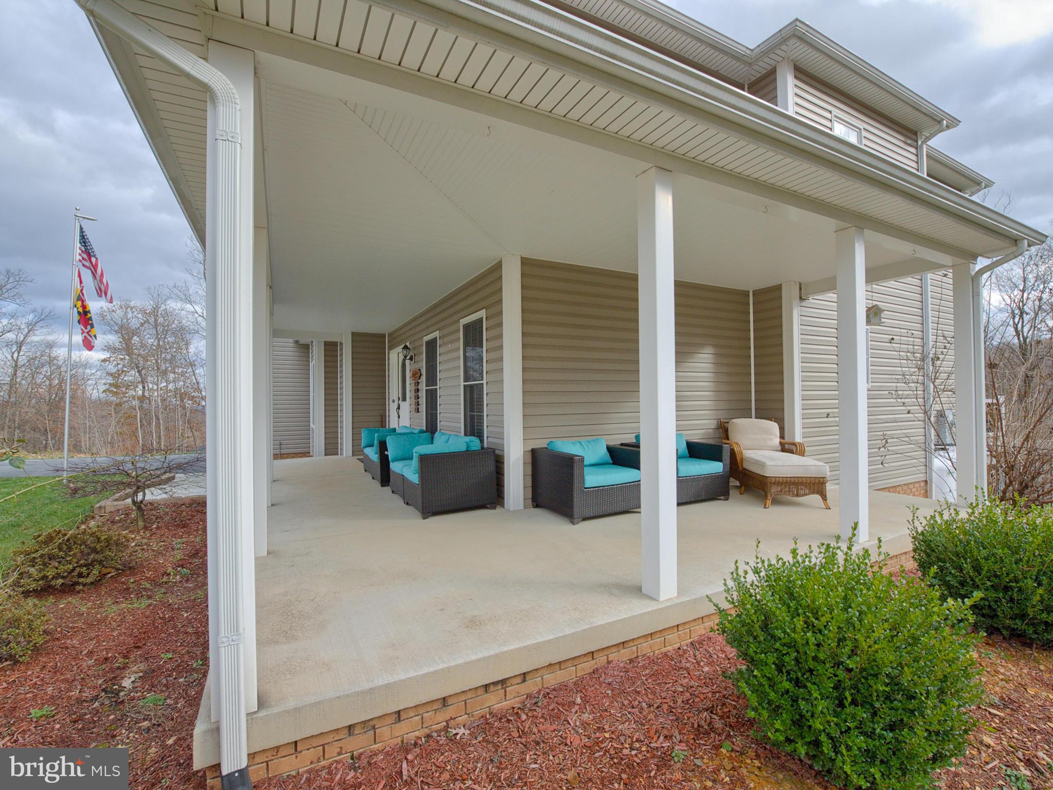 4947 Old Swimming Pool Road Frederick, MD 21703 - Photo 68 of 72 a view of a house with porch and sitting area