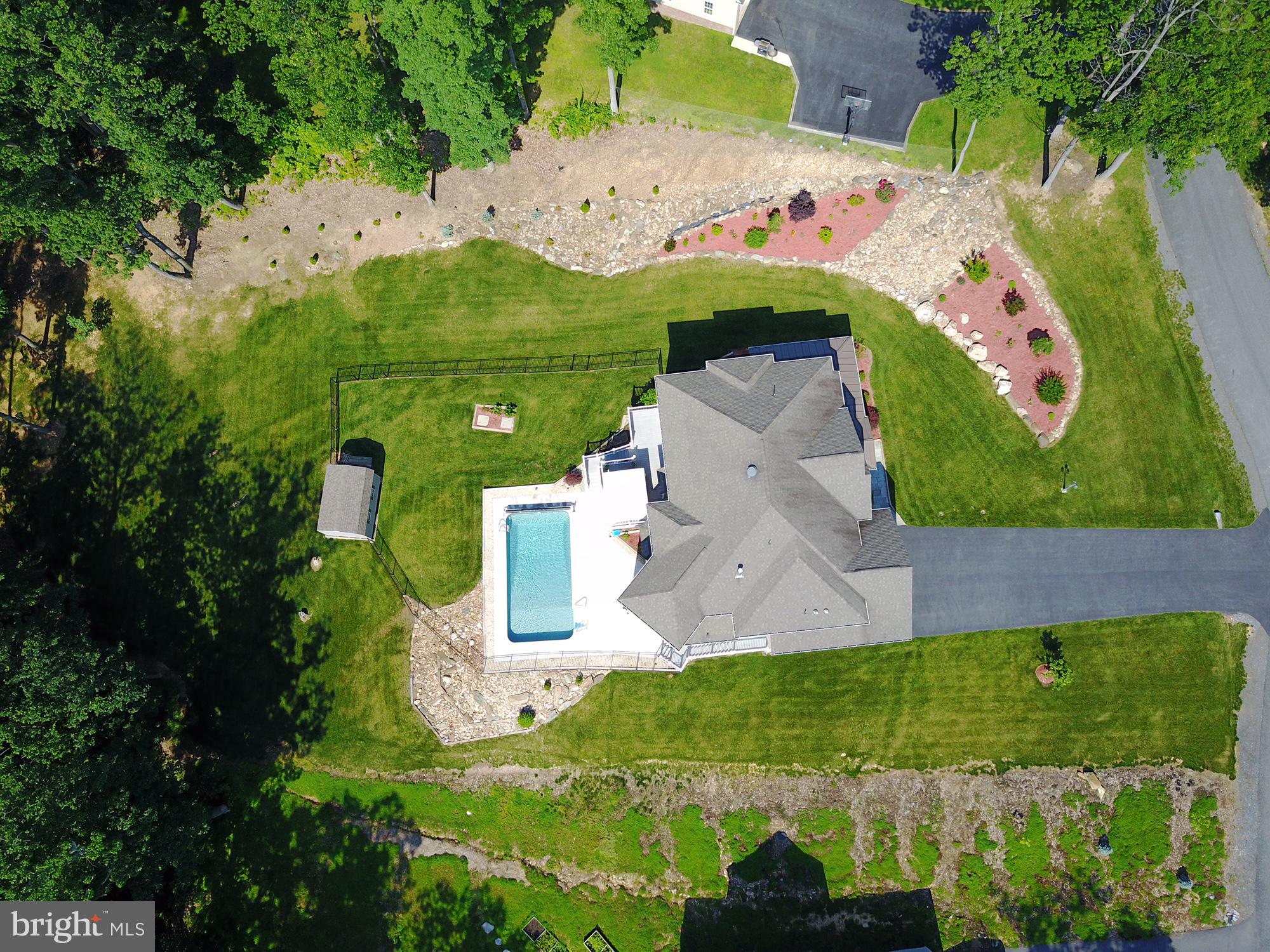 4947 Old Swimming Pool Road Frederick, MD 21703 - Photo 72 of 72 an aerial view of a house with a garden