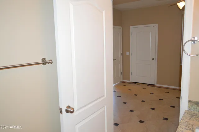 a view of a hallway with closet