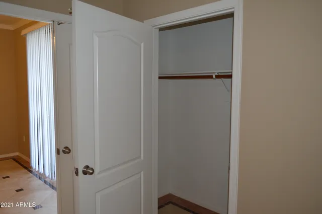 a view of walk in closet with window