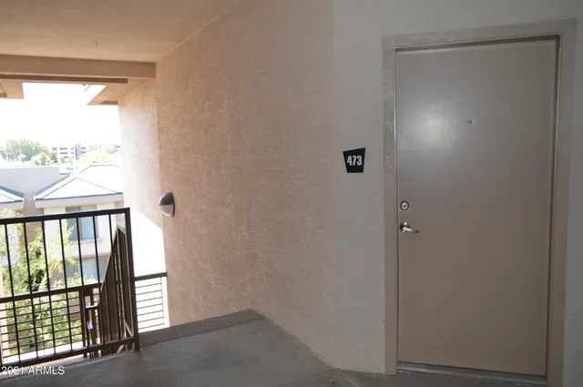 a view of a house with yard and tree s