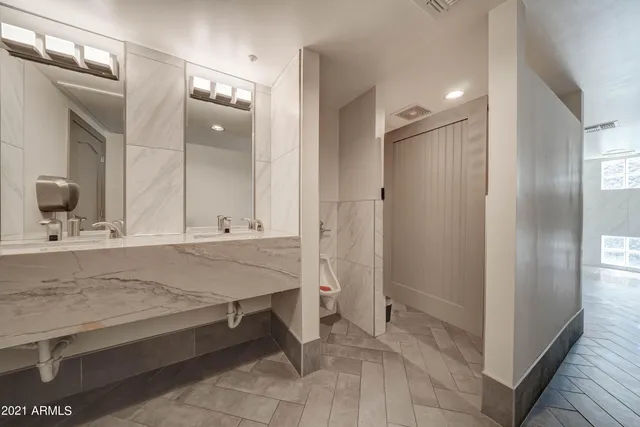 a backyard of a house with outdoor seating