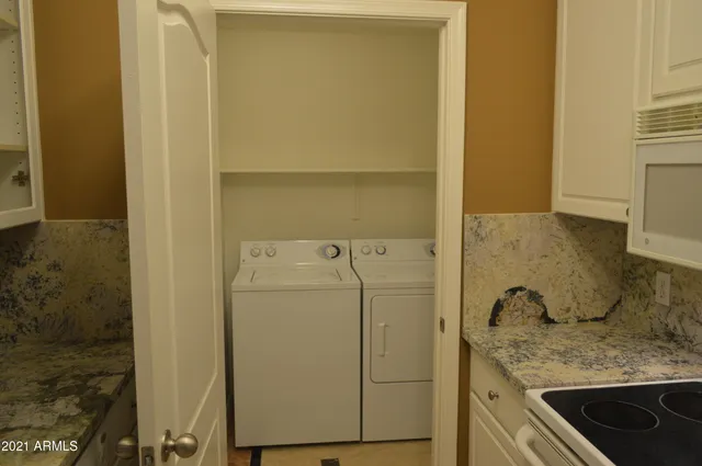 a view of a livingroom with a staircase