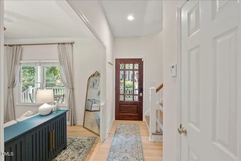 a room with furniture and a wooden door