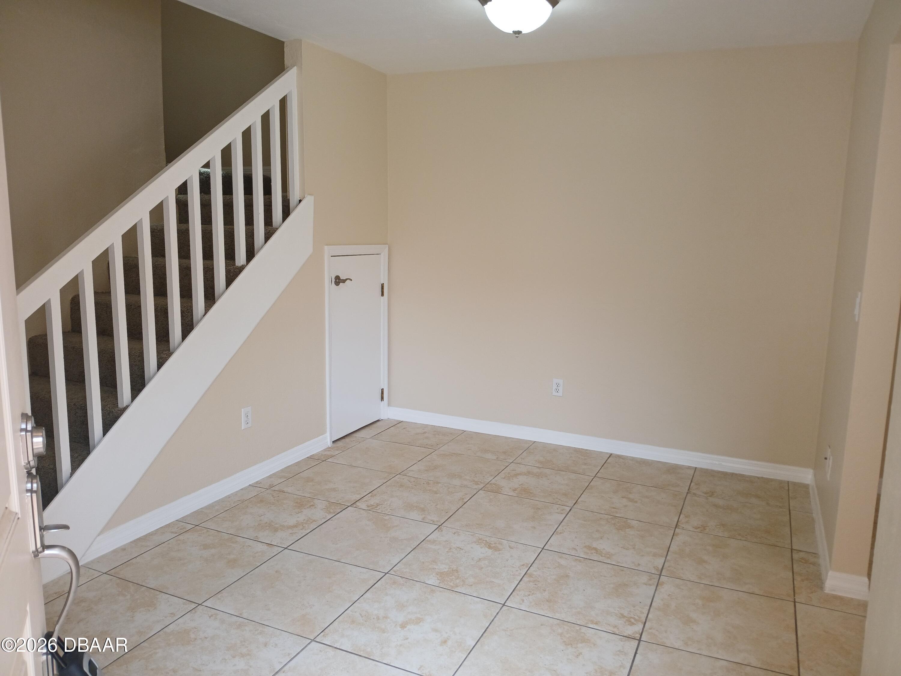 4514 Alder Drive Port Orange, FL 32127 - Photo 6 of 15 a view of an entryway with staircase
