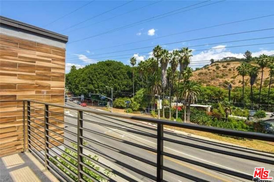 2776 Wright Lane Los Angeles, CA 90068 - Photo 16 of 16 a view of a balcony with a tree