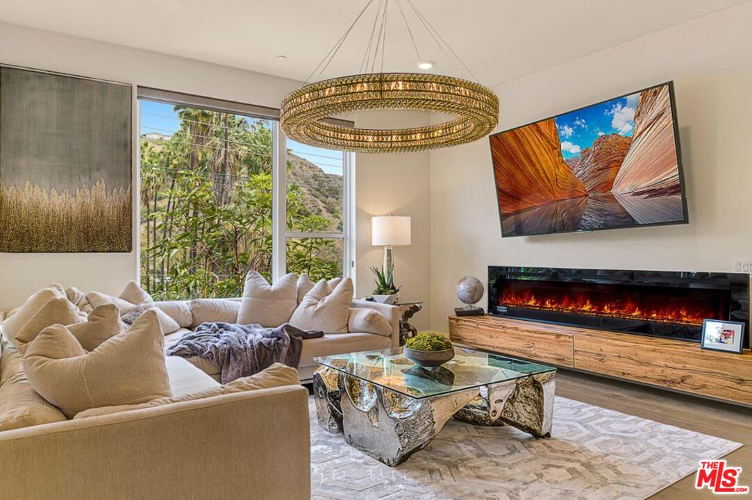 2776 Wright Lane Los Angeles, CA 90068 - Photo 5 of 16 a living room with furniture and a large window