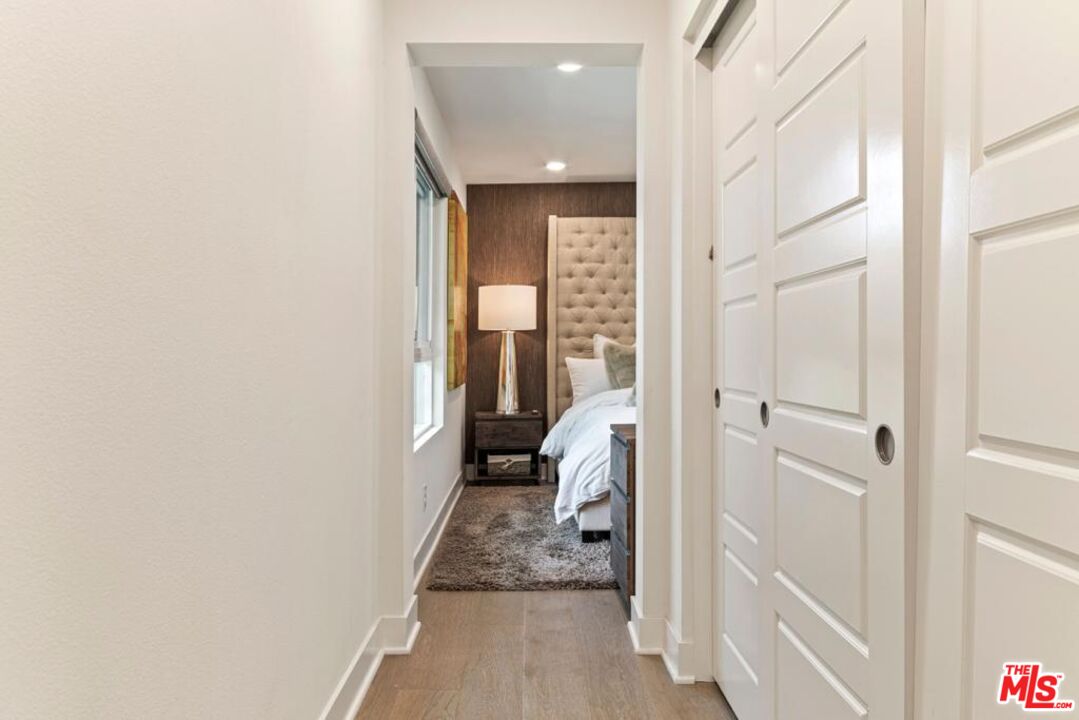 2776 Wright Lane Los Angeles, CA 90068 - Photo 9 of 16 a view of a hallway with a livingroom with furniture and front door
