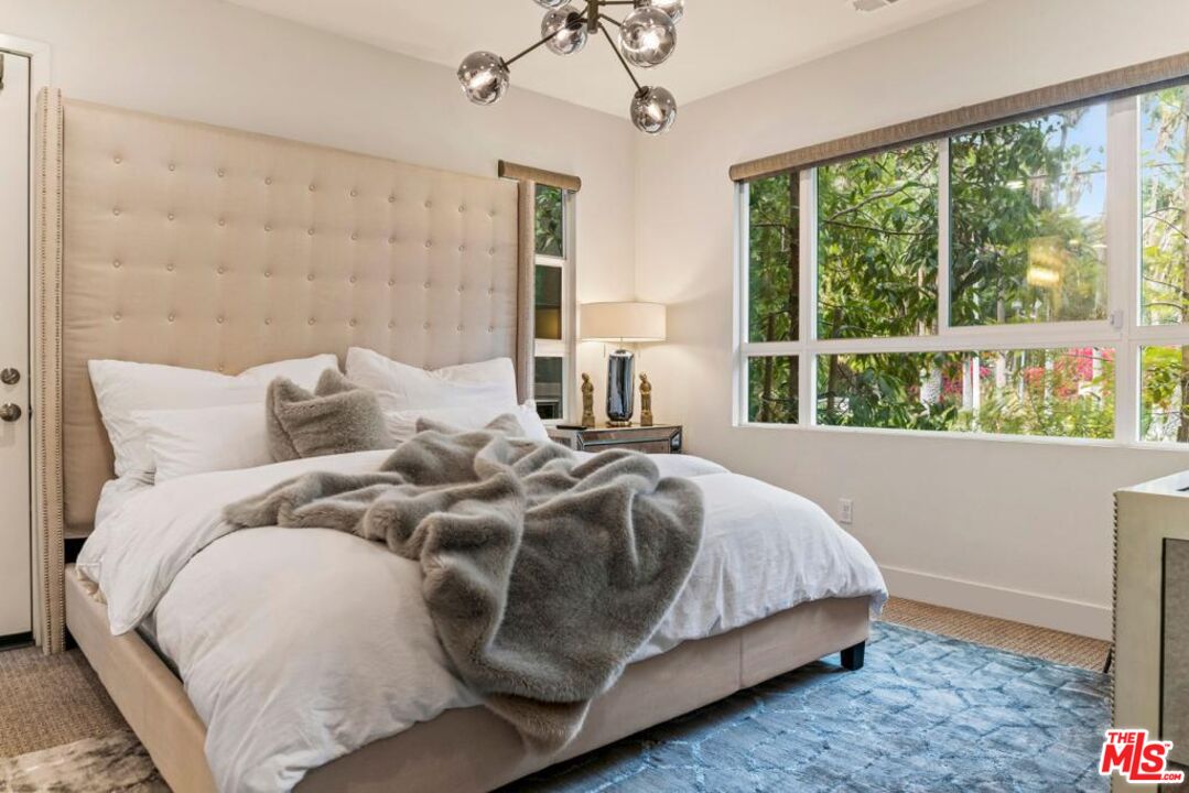 2776 Wright Lane Los Angeles, CA 90068 - Photo 10 of 16 a bedroom with a bed and a window
