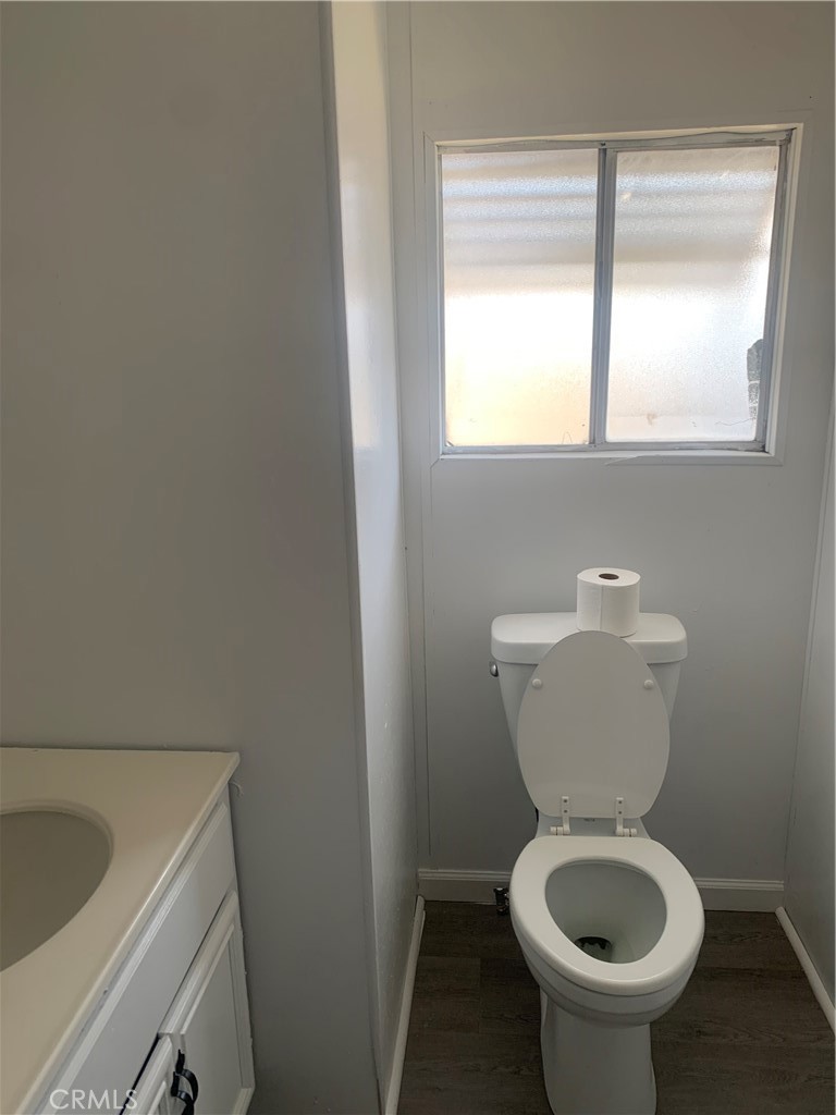 2865 West Rialto Avenue, Unit 2 Rialto, CA 92376 - Photo 10 of 19 a bathroom with a toilet and a sink