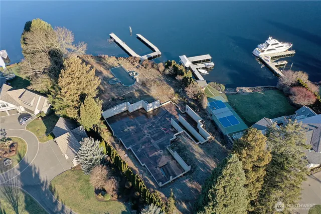 a view of a street with potted plants