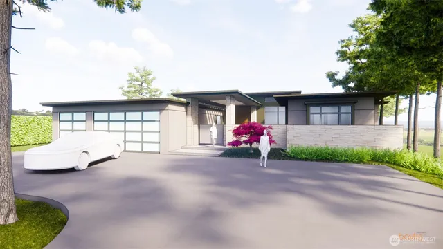 a view of a house with a yard and potted plants