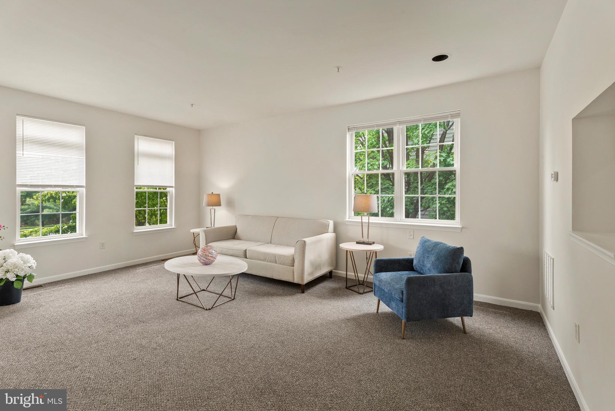 1709 Woodruff Way Frederick, MD 21701 - Photo 5 of 42 a living room with furniture and windows