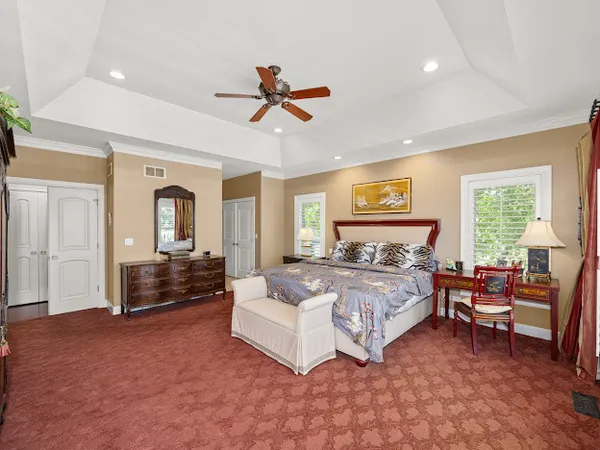 a bed room with a bed and furniture