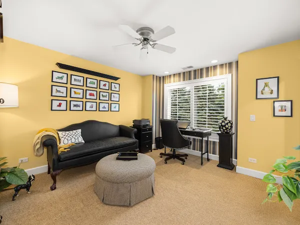 a bedroom with double bed furniture and a window