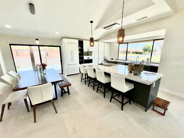 a living room with furniture and a table
