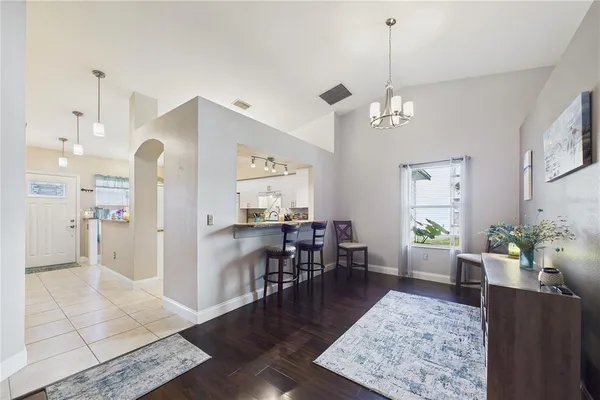 a view of outdoor space with deck and yard