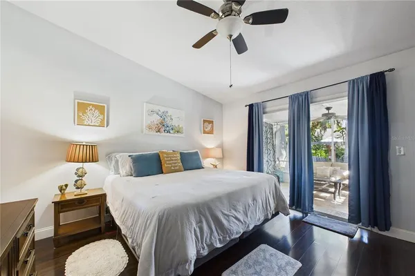 a view of backyard with barbeque grill and outdoor seating