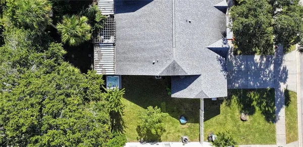 a kitchen with stainless steel appliances granite countertop a refrigerator sink and white cabinets