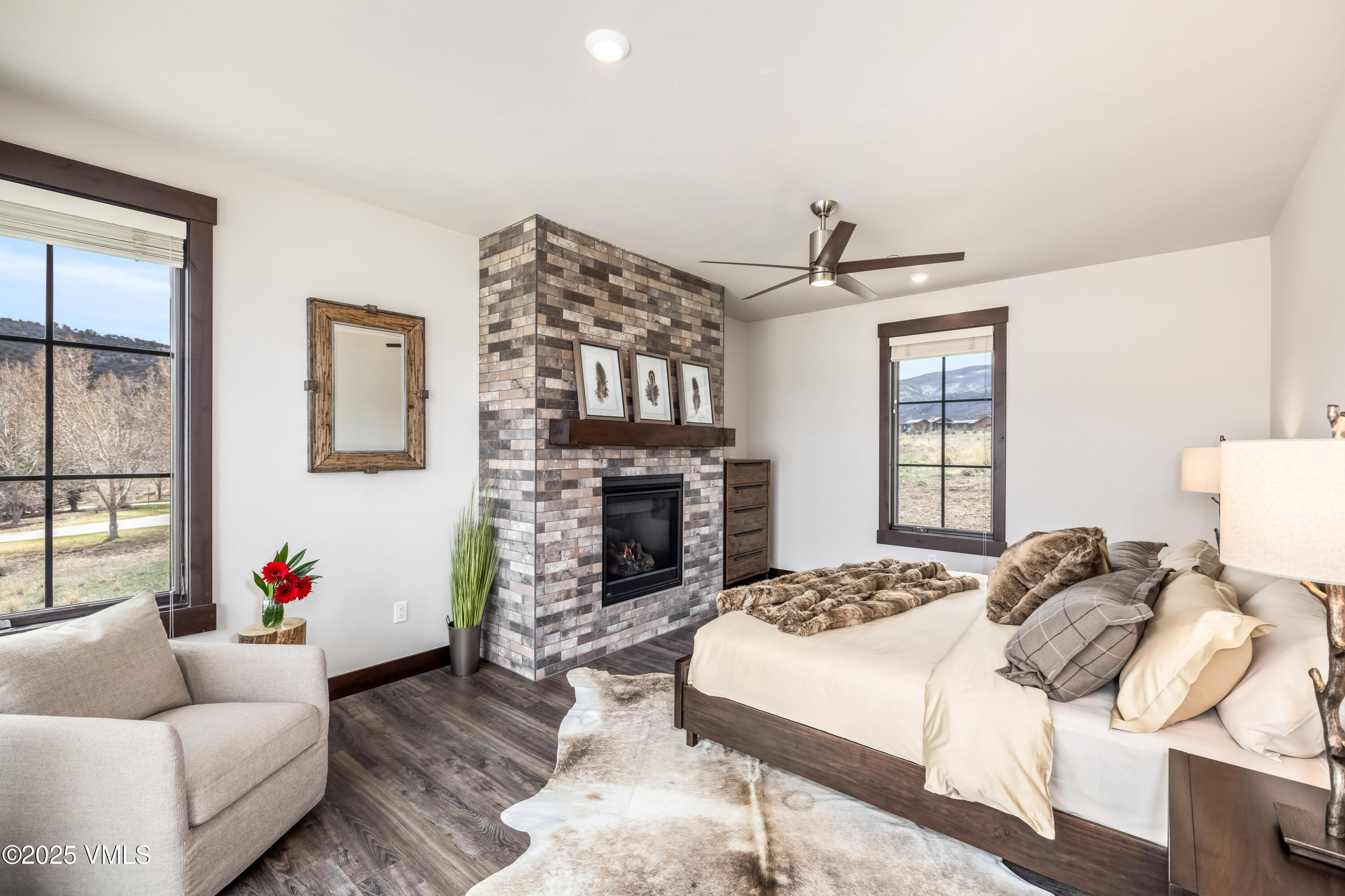 86 Hunters View Lane Eagle, CO 81631 - Photo 15 of 28 a bedroom with a bed couch and window