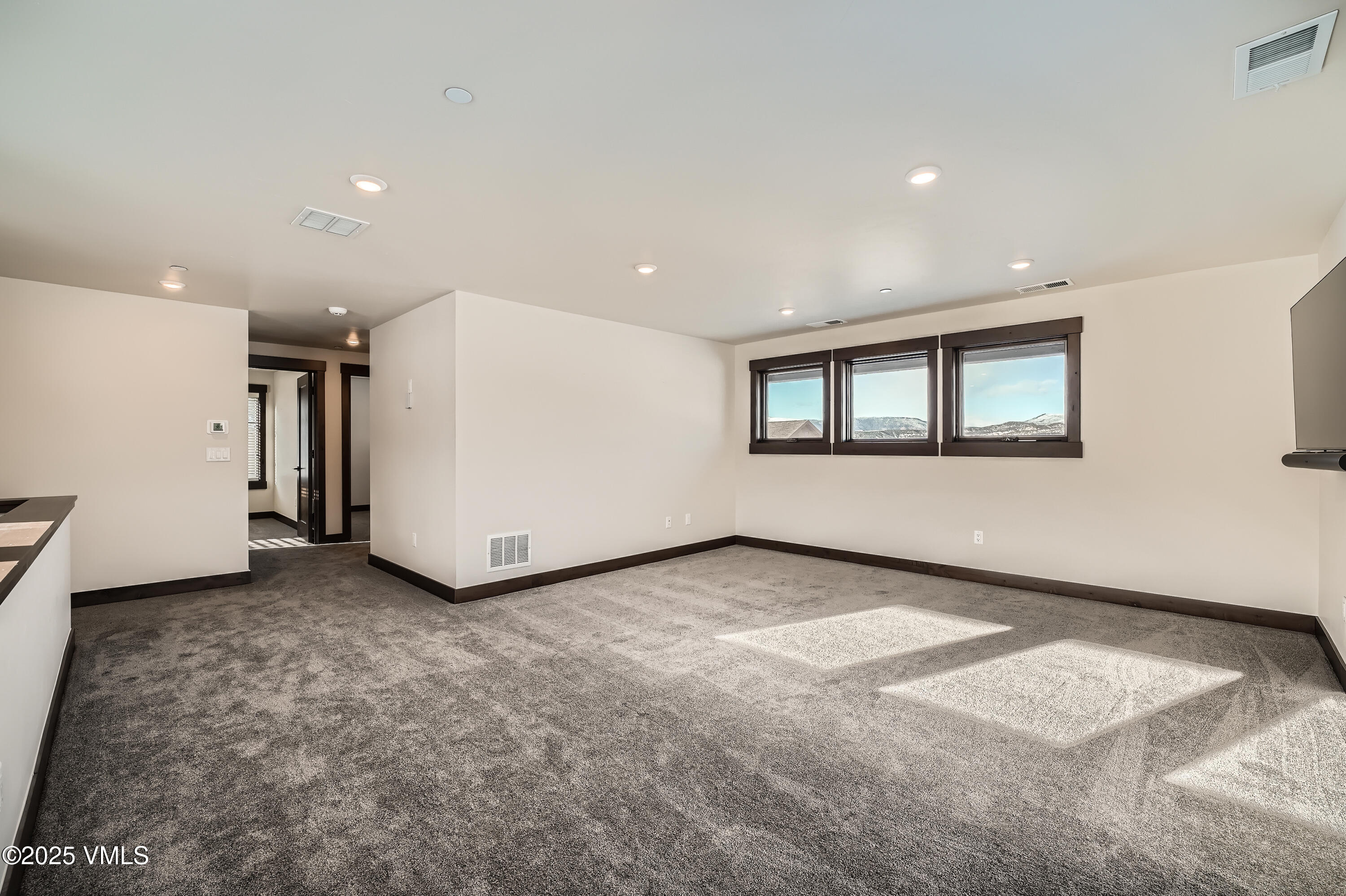 86 Hunters View Lane Eagle, CO 81631 - Photo 22 of 28 a view of a big room with closet and windows