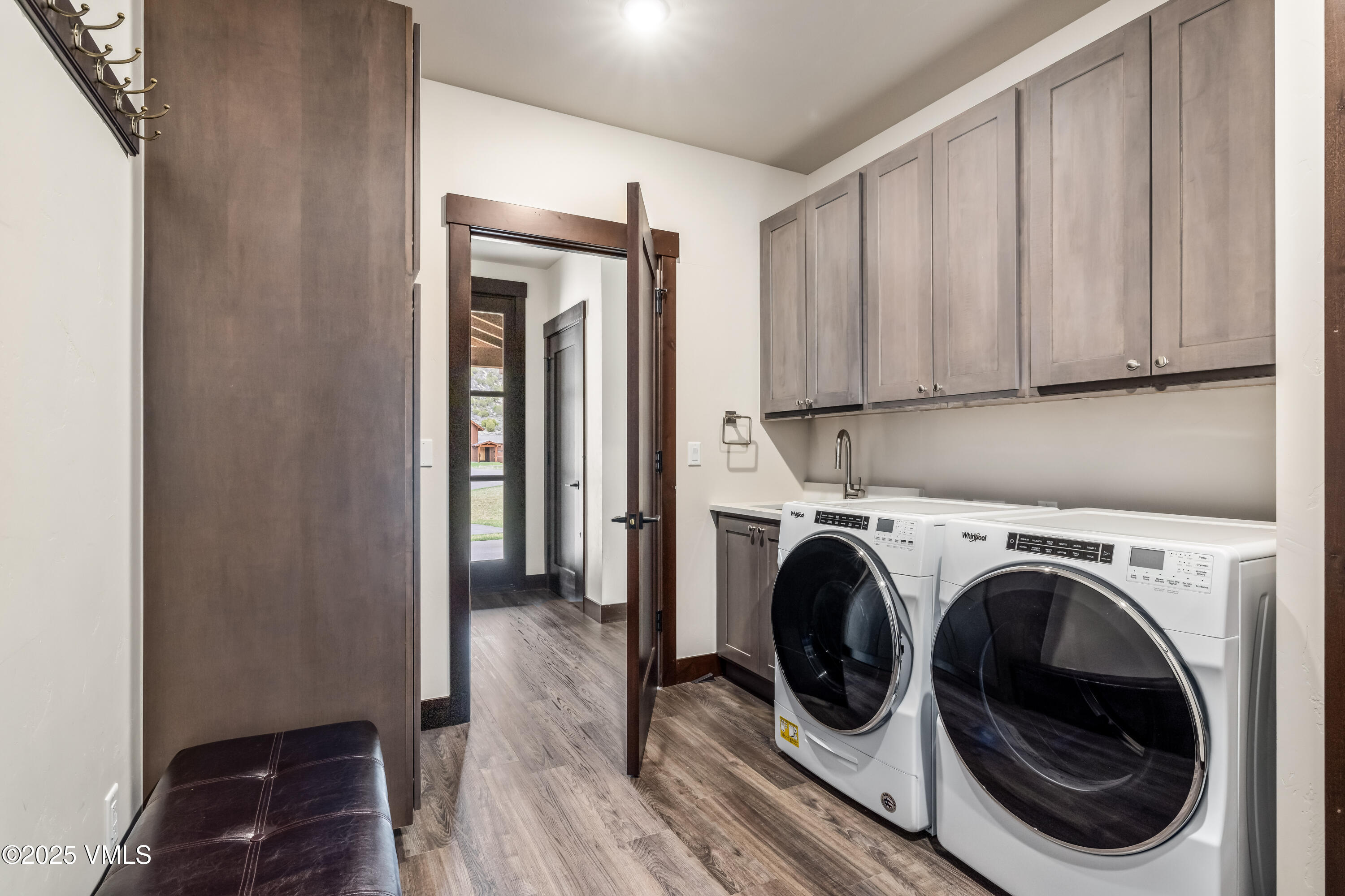 86 Hunters View Lane Eagle, CO 81631 - Photo 26 of 28 a view of a hallway with washer and dryer