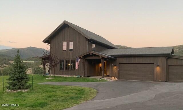 86 Hunters View Lane Eagle, CO 81631 - Photo 28 of 28 a front view of a house with garden